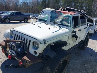 2016 Jeep Wrangler Unlimited Sahara z VIN 1C4HJWEG3GL115175, wystawiony jako IAAI lot #41686551 z przebiegiem Nie podano mil oraz . Historia ofert i sprzedaży dostępna na DreamBid. Obrazek 6.