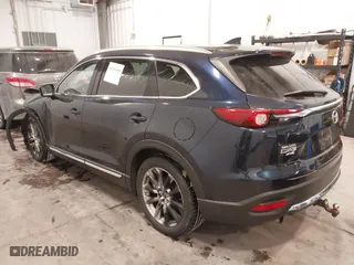 2016 Mazda CX-9 Grand Touring with VIN JM3TCBDY9G0109770, listed as a IAAI auction lot 41551085 with 131,812 mi miles. Bid and sale history available at carsss.com. Image 3.