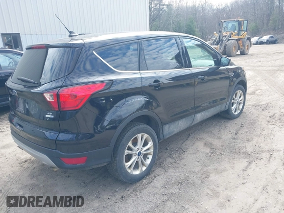 2019 Ford Escape SE with VIN 1FMCU9GD9KUA66116, listed as a IAAI auction lot 42070604 with 98,777 mi miles. Bid and sale history available at carsss.com. Image 4.