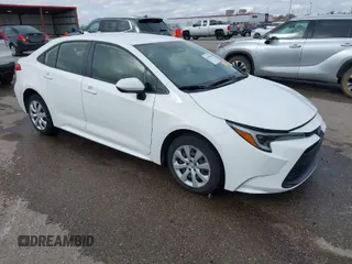 2023 Toyota Corolla Hybrid LE with VIN JTDBCMFE2P3007101, listed as a IAAI auction lot 40799086 with 13,974 mi miles. Bid and sale history available at carsss.com. Image 1.