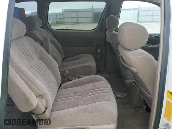 2001 Toyota Sienna LE with VIN 4T3ZF13C21U369506, listed as a Copart auction lot 74561634 with 0 mi miles and Salvage Title. Bid and sale history available at carsss.com. Image 11.