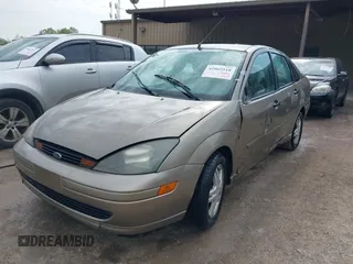 2003 Ford Focus SE with VIN 1FAFP34PX3W123696, listed as a IAAI auction lot 42065510 with 159,842 mi miles and . Bid and sale history available at carsss.com. Image 2.