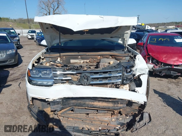 2018 Volkswagen Atlas SE with VIN 1V2CR2CA2JC579073, listed as a IAAI auction lot 41968461 with 118,656 mi miles and . Bid and sale history available at DreamBid. Image 6.