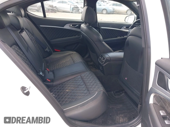 2021 Genesis G70 3.3T with VIN KMTG34LEXMU076278, listed as a IAAI auction lot 41976406 with 44,684 mi miles and . Bid and sale history available at DreamBid. Image 8.
