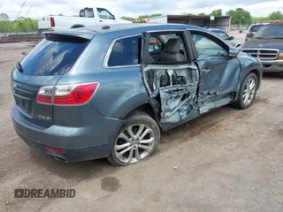 2012 Mazda CX-9 Grand Touring z VIN JM3TB2DA3C0355617, wystawiony jako IAAI lot #42198050 z przebiegiem 185 852 mil mil oraz . Historia ofert i sprzedaży dostępna na DreamBid. Obrazek 4.