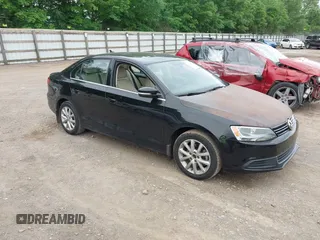 2014 Volkswagen Jetta SE with VIN 3VWD07AJ8EM401640, listed as a IAAI auction lot 42197709 with 170,068 mi miles and . Bid and sale history available at DreamBid. Image 1.