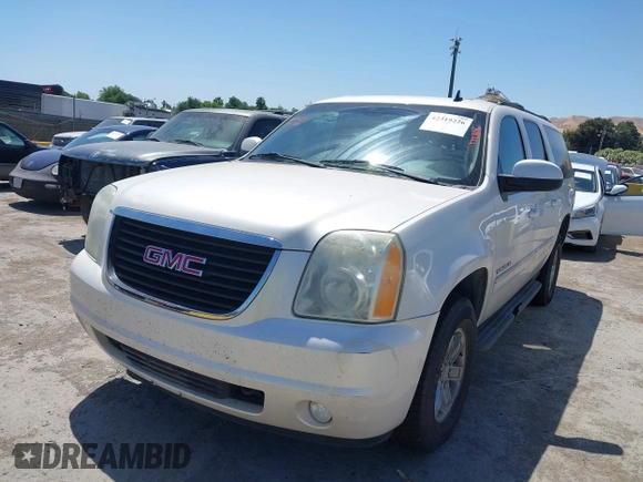 2012 GMC Yukon XL SLT z VIN 1GKS2LE74CR100438, wystawiony jako IAAI lot #42319226 z przebiegiem 172 628 mil mil oraz . Historia ofert i sprzedaży dostępna na DreamBid. Obrazek 6.