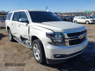 2015 Chevrolet Suburban LT with VIN 1GNSKJKC9FR717038, listed as a IAAI auction lot 41815942 with 123,095 mi miles and . Bid and sale history available at DreamBid. Image 1.