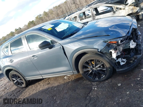 2022 Mazda CX-5 2.5 S Preferred Package with VIN JM3KFBCM1N0562277, listed as a IAAI auction lot 41421324 with 68,528 mi miles. Bid and sale history available at carsss.com. Image 13.