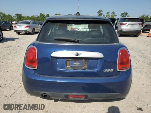 2014 MINI Hardtop with VIN WMWXM5C59ET972044, listed as a Copart auction lot 52519775 with 91,490 mi miles and Clean Title. Bid and sale history available at DreamBid. Image 6.