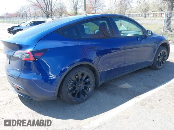 2022 Tesla Model Y Long Range with VIN 7SAYGDEE3NF449873, listed as a IAAI auction lot 41900271 with 38,571 mi miles and . Bid and sale history available at carsss.com. Image 4.
