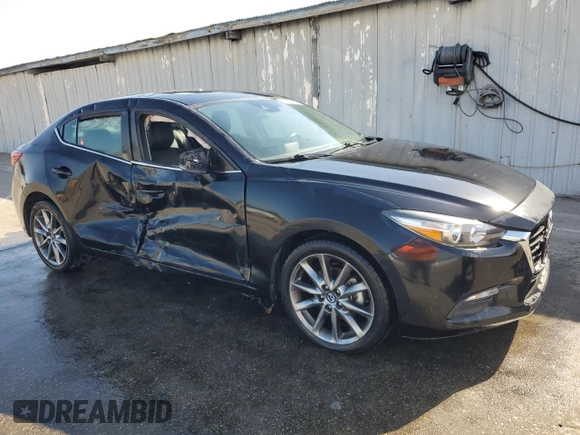 2018 Mazda 3 Touring with VIN 3MZBN1V38JM245479, listed as a Copart auction lot 52647885 with 65,045 mi miles and Clean Title. Bid and sale history available at DreamBid. Image 4.
