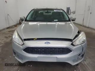 2016 Ford Focus SE with VIN 1FADP3F2XGL355148, listed as a Copart auction lot 73304284 with 166,785 mi miles and Salvage Title. Bid and sale history available at carsss.com. Image 5.