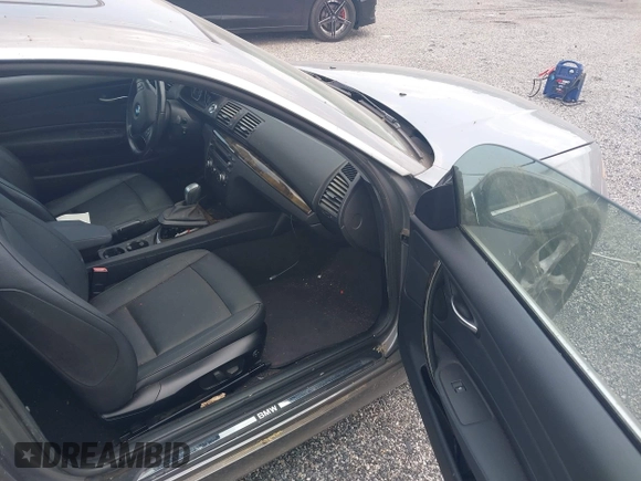 2011 BMW 1 Series 128i with VIN WBAUP9C57BVL90171, listed as a IAAI auction lot 42801051 with 150,148 mi miles and . Bid and sale history available at DreamBid. Image 5.