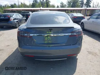 2014 Tesla Model S 60 with VIN 5YJSA1H18EFP38078, listed as a IAAI auction lot 42748619 with 159,285 mi miles and . Bid and sale history available at DreamBid. Image 16.