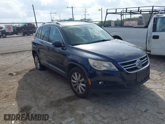 2011 Volkswagen Tiguan SE with VIN WVGAV7AX7BW530357, listed as a IAAI auction lot 42740821 with 170,636 mi miles and . Bid and sale history available at DreamBid. Image 1.