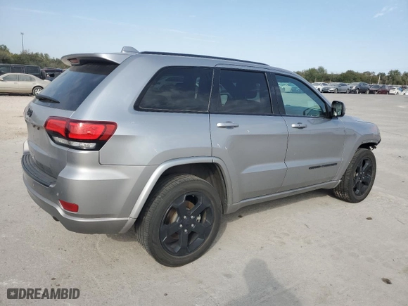 2021 Jeep Grand Cherokee Laredo X with VIN 1C4RJEAG0MC680564, listed as a Copart auction lot 75629034 with 75,072 mi miles and Salvage Title. Bid and sale history available at carsss.com. Image 3.