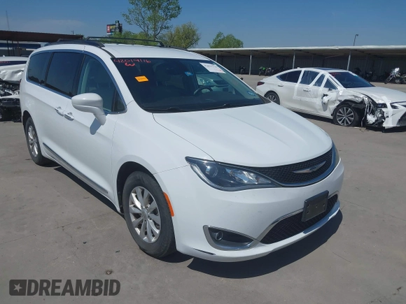 2017 Chrysler Pacifica Touring L z VIN 2C4RC1BGXHR759030, wystawiony jako IAAI lot #42019116 z przebiegiem 110 454 mil mil oraz . Historia ofert i sprzedaży dostępna na DreamBid. Obrazek 1.