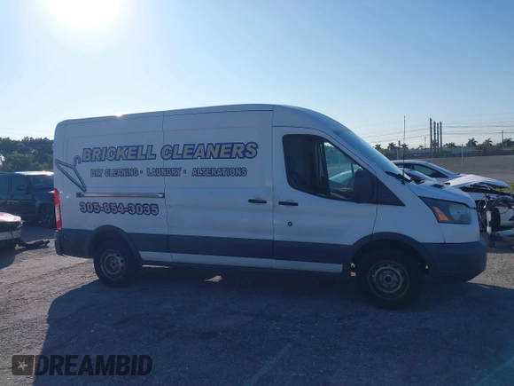 2015 Ford Transit Cargo with VIN 1FTNE2CM9FKA64133, listed as a IAAI auction lot 41312926 with 117,176 mi miles and . Bid and sale history available at carsss.com. Image 13.