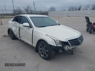 2013 Cadillac ATS with VIN 1G6AG5RX3D0138802, listed as a IAAI auction lot 41192671 with 77,130 mi miles and . Bid and sale history available at DreamBid. Image 1.