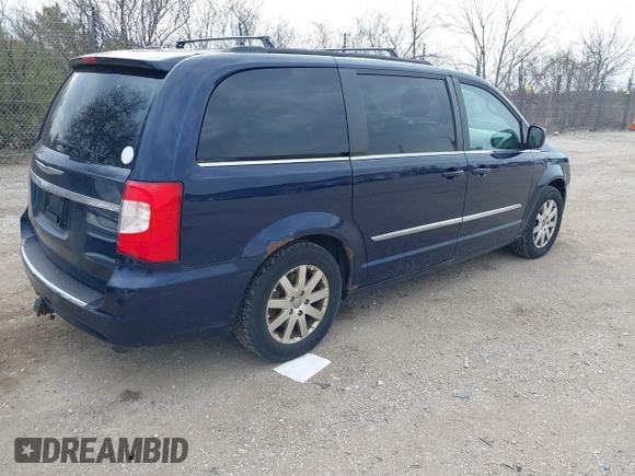 2013 Chrysler Town & Country Touring with VIN 2C4RC1BG2DR598182, listed as a IAAI auction lot 42026752 with 228,792 mi miles. Bid and sale history available at carsss.com. Image 4.