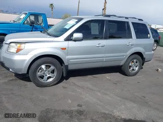 2007 Honda Pilot EX-L with VIN 5FNYF28677B005956, listed as a IAAI auction lot 41948401 with 185,599 mi miles. Bid and sale history available at carsss.com. Image 6.