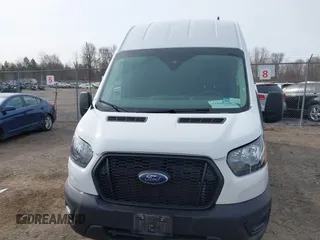 2023 Ford Transit Cargo with VIN 1FTBR3U80PKA70337, listed as a IAAI auction lot 41895248 with 51,430 mi miles and . Bid and sale history available at DreamBid. Image 12.