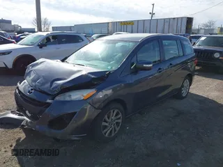 2013 Mazda 5 Sport z VIN JM1CW2BL3D0155694, wystawiony jako IAAI lot #41641169 z przebiegiem Nie podano mil oraz . Historia ofert i sprzedaży dostępna na DreamBid. Obrazek 2.