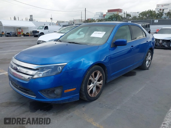 2012 Ford Fusion SE with VIN 3FAHP0HA9CR351141, listed as a IAAI auction lot 42140427 with 219,049 mi miles. Bid and sale history available at carsss.com. Image 2.