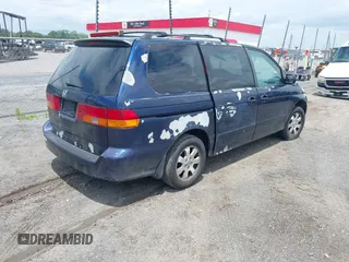 2003 Honda Odyssey EX-L z VIN 5FNRL18923B101344, wystawiony jako IAAI lot #42379995 z przebiegiem 222 877 mil mil oraz . Historia ofert i sprzedaży dostępna na DreamBid. Obrazek 4.