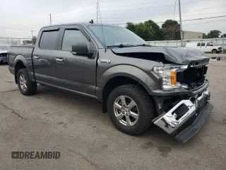 2019 Ford F-150 XL with VIN 1FTEW1E41KFC39126, listed as a Copart auction lot 61358815 with 43,765 mi miles and Salvage title. Bid and sale history available at DreamBid. Image 4.