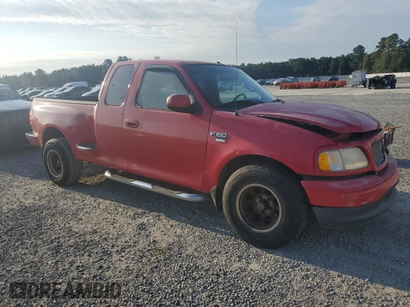 2001 Ford F-150 XL with VIN 2FTRX07LX1CA30894, listed as a Copart auction lot 74761224 with 0 mi miles and Salvage Title. Bid and sale history available at carsss.com. Image 4.