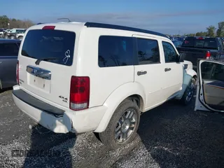 2007 Dodge Nitro R/T with VIN 1D8GU58647W656977, listed as a IAAI auction lot 41508811 with 286,570 mi miles. Bid and sale history available at carsss.com. Image 4.