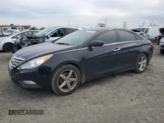 2012 Hyundai Sonata Limited with VIN 5NPEC4AB7CH411987, listed as a Copart auction lot 47924155 with 163,430 mi miles and Salvage Title. Bid and sale history available at carsss.com. Image 1.