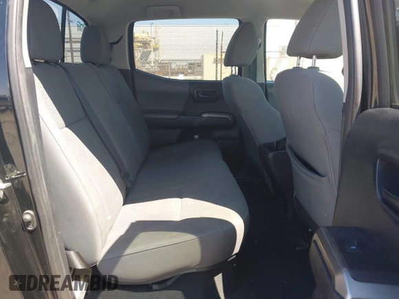 2018 Toyota Tacoma SR5 with VIN 3TMAZ5CN1JM061127, listed as a IAAI auction lot 42012247 with 119,381 mi miles and . Bid and sale history available at DreamBid. Image 8.