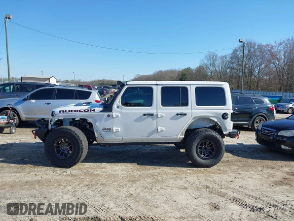 2022 Jeep Wrangler Unlimited Rubicon z VIN 1C4JJXFGXNW121489, wystawiony jako IAAI lot #41749550 z przebiegiem 56 601 mil mil oraz . Historia ofert i sprzedaży dostępna na DreamBid. Obrazek 15.