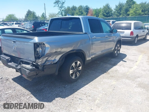 2020 Honda Ridgeline RTL with VIN 5FPYK3F5XLB019296, listed as a IAAI auction lot 42204290 with 48,197 mi miles and . Bid and sale history available at DreamBid. Image 4.
