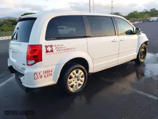 2017 Dodge Grand Caravan SE with VIN 2C4RDGBG1HR717961, listed as a IAAI auction lot 40874013 with 298,790 mi miles. Bid and sale history available at carsss.com. Image 4.