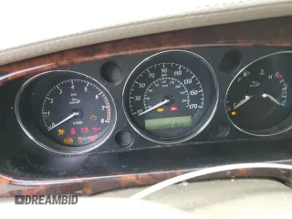 2004 Jaguar XJ with VIN SAJEA74C84SG03857, listed as a Copart auction lot 62156875 with 92,649 mi miles and Salvage title. Bid and sale history available at DreamBid. Image 9.