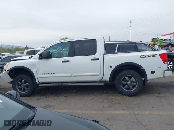 2014 Nissan Titan Pro-4X with VIN 1N6BA0ECXEN501915, listed as a IAAI auction lot 42097967 with 120,851 mi miles and . Bid and sale history available at DreamBid. Image 14.