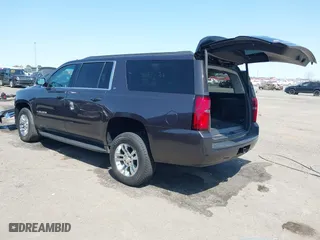 2018 Chevrolet Suburban LT with VIN 1GNSCHKCXJR128787, listed as a IAAI auction lot 41909965 with 123,020 mi miles. Bid and sale history available at carsss.com. Image 3.