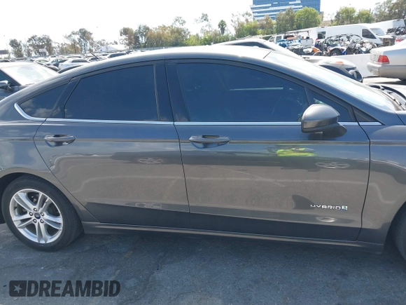 2018 Ford Fusion Hybrid SE with VIN 3FA6P0LU4JR261594, listed as a IAAI auction lot 40360797 with 128,533 mi miles. Bid and sale history available at carsss.com. Image 13.