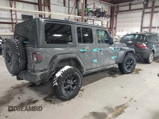2021 Jeep Wrangler Unlimited Sport S with VIN 1C4HJXDN9MW819753, listed as a IAAI auction lot 41415569 with 43,263 mi miles and . Bid and sale history available at DreamBid. Image 4.