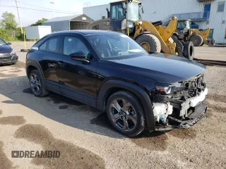 2022 Mazda MX-30 Premium Plus Package with VIN JM1DRADB6N0101074, listed as a Copart auction lot 68379044 with 43,559 mi miles and Salvage Title. Bid and sale history available at carsss.com. Image 4.