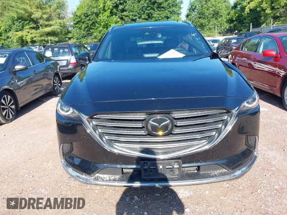 2018 Mazda CX-9 Grand Touring with VIN JM3TCBDYXJ0208962, listed as a IAAI auction lot 42629720 with 123,929 mi miles and . Bid and sale history available at DreamBid. Image 13.