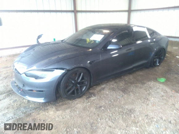 2022 Tesla Model S with VIN 5YJSA1E57NF484158, listed as a IAAI auction lot 41531574 with 16,079 mi miles and . Bid and sale history available at DreamBid. Image 17.
