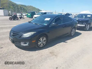 2009 Mazda 6 i Touring with VIN 1YVHP82A395M16573, listed as a IAAI auction lot 42122769 with 137,763 mi miles and . Bid and sale history available at carsss.com. Image 2.