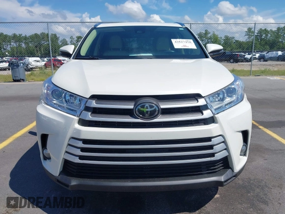 2019 Toyota Highlander SE with VIN 5TDKZRFH7KS551929, listed as a IAAI auction lot 42627458 with 84,117 mi miles and . Bid and sale history available at DreamBid. Image 12.
