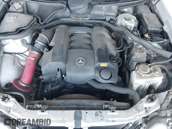 2001 Mercedes-Benz E-Class with VIN WDBJF65J81B215945, listed as a IAAI auction lot 41707410 with 227,668 mi miles. Bid and sale history available at carsss.com. Image 10.