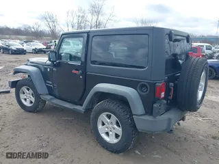 2011 Jeep Wrangler Sport with VIN 1J4AA2D1XBL634783, listed as a IAAI auction lot 41928702 with 154,379 mi miles. Bid and sale history available at carsss.com. Image 3.